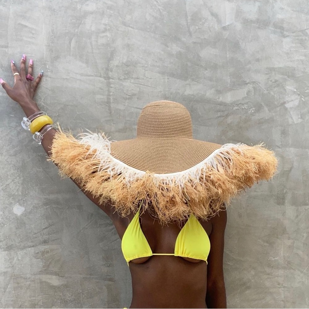 Oversized straw beach hat worn once on vacation